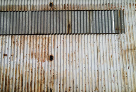 background made of corrugated metal sheets, industrial wallの写真素材