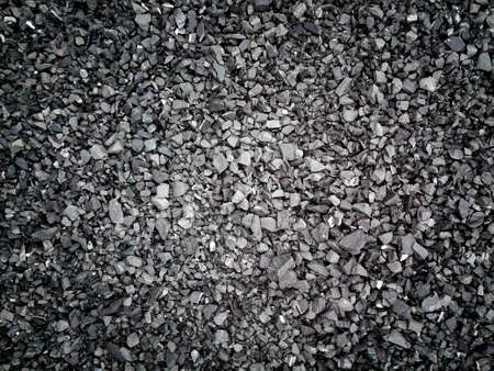 background and texture concept, close up of decorative stone wall or surfaceの写真素材
