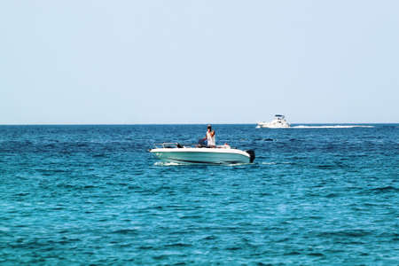 A white speedboat on open sea in the Croatiaの写真素材