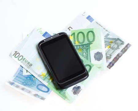 Modern mobile smart phone and  euro banknotes on white backgroundの写真素材
