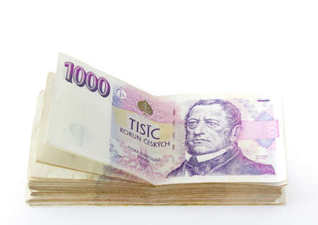 czech banknotes nominal value one and two thousand crowns on white backgroundの写真素材