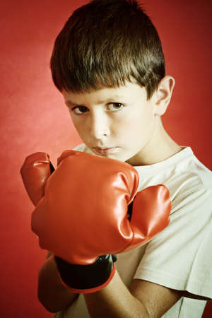 Young Boy Boxer with red Boxing Gloves の写真素材