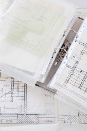 Architectural plans of the old paper tracing paper and file with the projectの写真素材