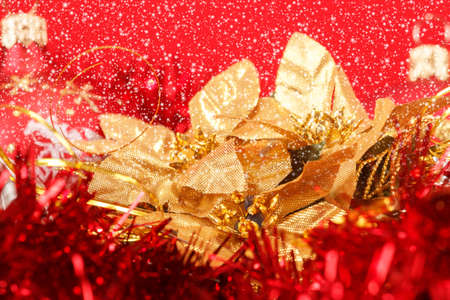 Red christmas balls and decorations on red backgroundの写真素材