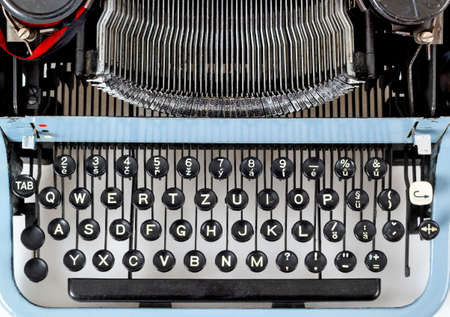 retro typewriter close up with detail of keys and letters mechanismの写真素材