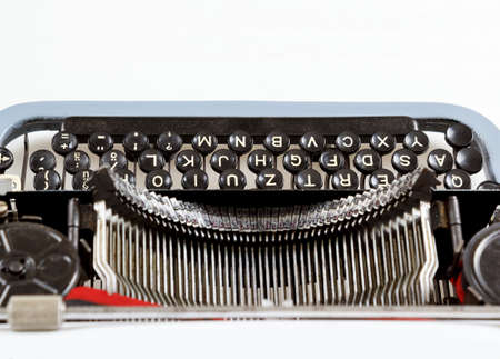 retro typewriter close up with detail of keys and letters mechanism
