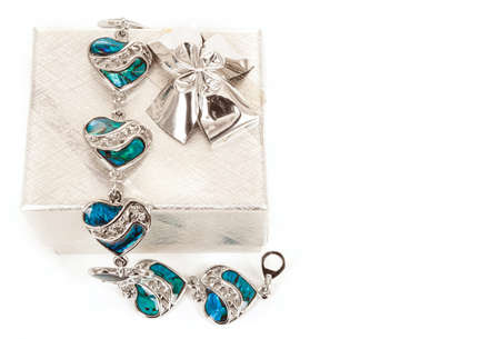 female bracelet with hearts and box isolated on white の写真素材