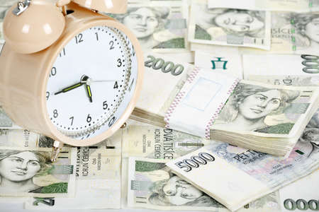 time is money business concept with czech banknotes crownの写真素材