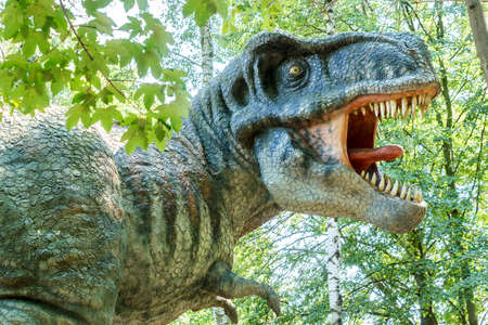 model of big tyranosaurus rex in the jungle