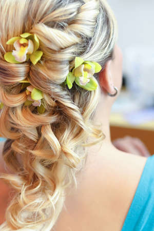 Beautiful wedding hairstyle with flowers in hair - rear view