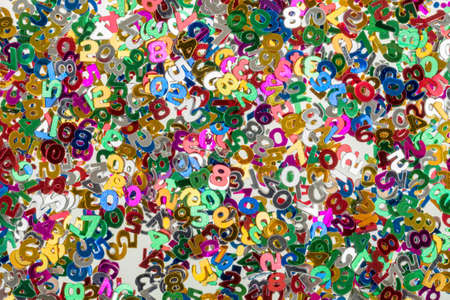 close up of small color numbers confetti background or backdrop