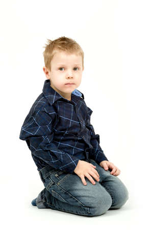 Studio portrait of young beautiful boy on white backgroundの写真素材