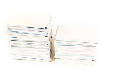 stack of business cards on the table isolated on whiteの写真素材