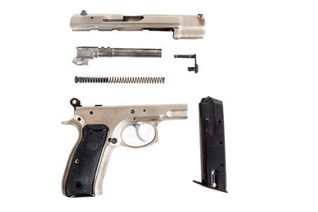 real Semi automatic gun disassembled on white backgroundの写真素材