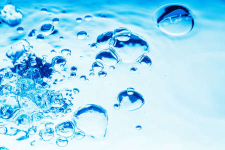 very nice abstract background of blue water drops from splash の写真素材