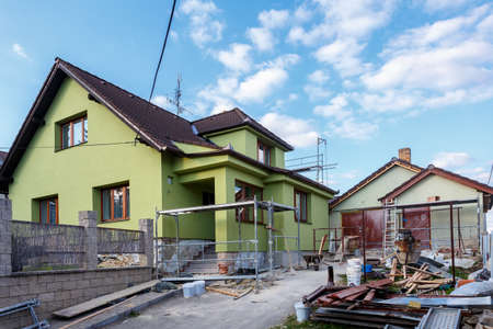 Construction or repair of the rural house, fixing facade, insulation and using colorの写真素材
