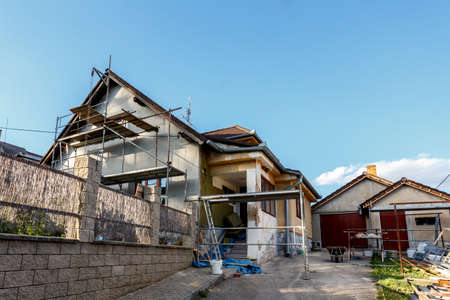 Construction or repair of the rural house, fixing facade, insulation and using colorの写真素材