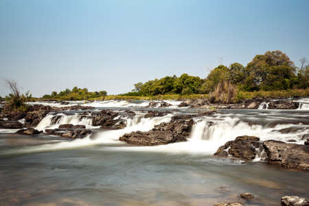 Famous Popa falls in Caprivi, North Namibia, with long exposureの写真素材