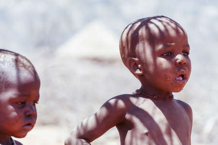NAMIBIA, KAMANJAB, OCTOBER 10: Unidentified child Himba tribe. The Himba are indigenous peoples...