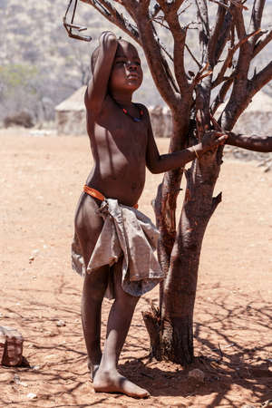 NAMIBIA, KAMANJAB, OCTOBER 10: Unidentified child Himba tribe. The Himba are indigenous peoples...