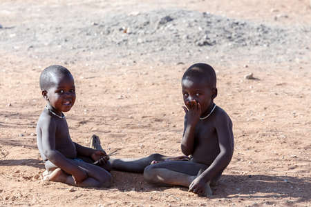 NAMIBIA, KAMANJAB, OCTOBER 10: Unidentified child Himba tribe. The Himba are indigenous peoples living in northern Namibia, in the Kunene region of South-West Africa on october 10 2014のeditorial素材