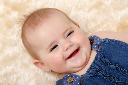 smiling infant baby - the first year of the new life