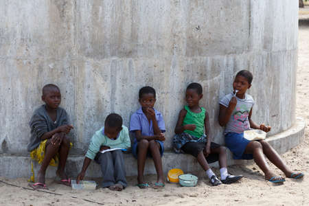 NAMIBIA, KAVANGO, OCTOBER 15: Happy Namibian school children waiting for a lesson. Kavango was the region with the highest poverty level in Namibia, more than 50% of the population were classified as poor. October 15, 2014, Namibiaのeditorial素材