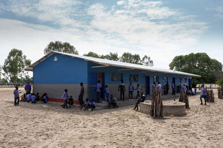 NAMIBIA, KAVANGO, OCTOBER 15: Happy Namibian school children waiting for a lesson. Kavango was the region with the highest poverty level in Namibia, more than 50% of the population were classified as poor. October 15, 2014, Namibiaのeditorial素材