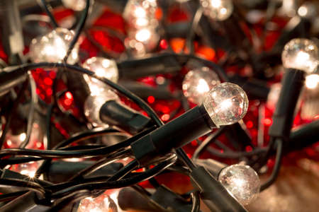 photo of white christmas lights background with shallow focusの写真素材