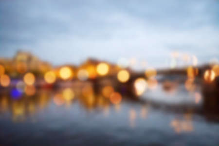 Blured lights from night Prague, view from river Vltavaの写真素材