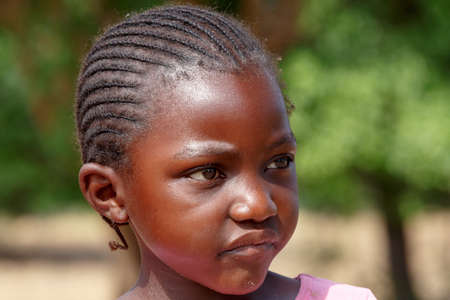 NAMIBIA, KAVANGO, OCTOBER 15: Unidentified child girl near town Rundu. Kavango is region with the...