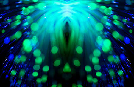 bunch of optical fibres flying from deep as blurred abstract technology backgroundの写真素材