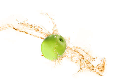Green apple with water splash, isolated on white backgroundの写真素材