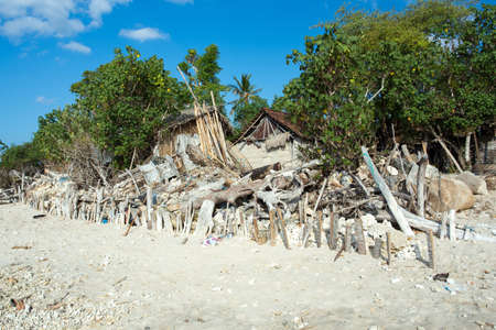 traditional indonesian poor house - shack on beach, Nusa Penida Island, Toyapakeh. Bali.の写真素材