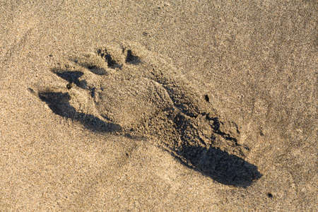 Nusa Penida, Crystal beach, Footprints in the sand. Bali Indonesiaの写真素材