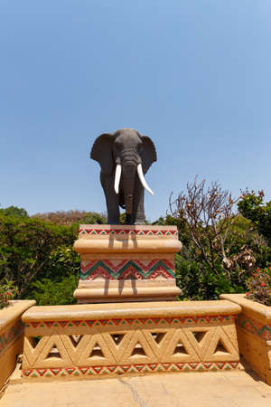Gigantic elephant statues on fluttering Bridge of Time in famous resort Lost City in Sun City, South Africaのeditorial素材
