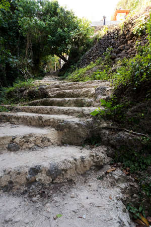 Stone staircase leading on Tembeling pool, Nusa Penida Bali Indonesia