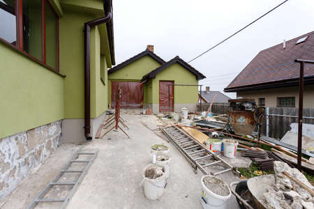 Construction or repair of the rural house, fixing facade, insulation and using colorの写真素材
