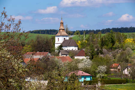 Small church in village in Czech republic Priseka. Beautiful view to spring vysocina countryside. Rural sceneの写真素材