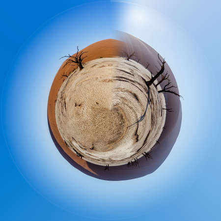 beautiful sunrise landscape of hidden Dead Vlei in Namib, blue sky, best place of Namibia. Beautiful Little planet with blue sky, ecology concept. Tiny green planet. Save Africa projectの写真素材
