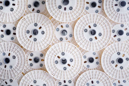 Group of optical fibers reels as technology backgroundの写真素材