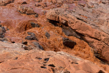 Betsiboka River stream with red sediments. In rainy season flooding its banks and flooding nearby. Maevatanana, Mahajanga province. Madagascar. の写真素材