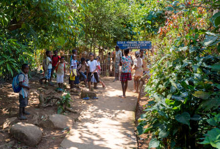 MADAGASCAR OCTOBER 17.2016: Malagasy school children waiting for a lesson behind rural school, Toamasina Province, October 17. 2016, Madagascarのeditorial素材