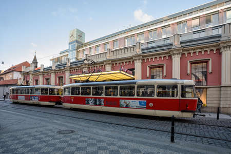 PRAGUE, CZECH REPUBLIC - DECEMBER 3, 2016: Tram in downtown Prague behind decorated shopping center Palladium in first advent christmas time. December 3, 2016 Prague, Czech Republic.のeditorial素材