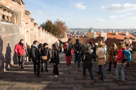 PRAGUE, CZECH REPUBLIC - DECEMBER 3, 2016: Tourists queue behind of the Prague Castle, due to anti-terrorist checks. December 3, 2016 Prague, Czech Republic.のeditorial素材