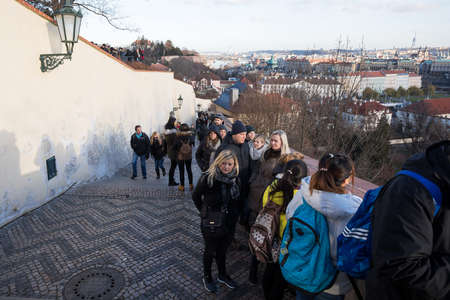 PRAGUE, CZECH REPUBLIC - DECEMBER 3, 2016: Tourists queue behind of the Prague Castle, due to anti-terrorist checks. December 3, 2016 Prague, Czech Republic.のeditorial素材