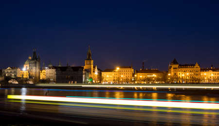 Night photo of Prague Old Town (Smetanovo Nabrezi) and Powder tower from the Vltava river, Bohemia, Czech Republicのeditorial素材