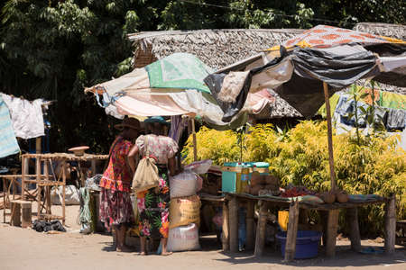 MAROANTSETRA ,MADAGASCAR OCTOBER 18.2016 Malagasy peoples on big colorful rural marketplace on main street of Maroantsetra city. Everyday ordinary life on street. Madagascar, October 18. 2016のeditorial素材