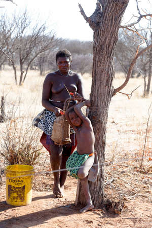 NAMIBIA, KAMANJAB, OCTOBER 10: Zemba tribe woman with ornaments on the neck, in the village of Himba...