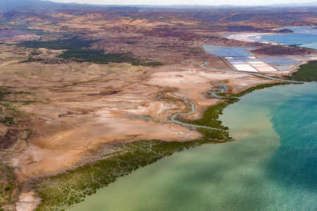 view from plane to the earth landscape Madagascar, coast near Antananarivo with beach, Deforestation is an global environmental problem.の写真素材